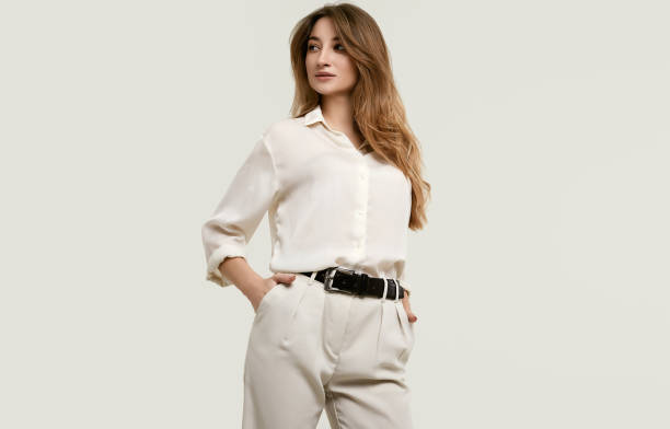 istock Gorgeous female brunette model in white clothes 1148523271