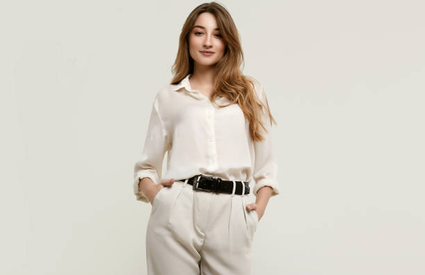 istock Gorgeous female brunette model in white clothes 1148523273