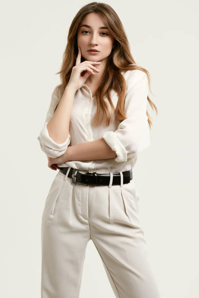 istock Gorgeous female brunette model in white clothes 1148523274