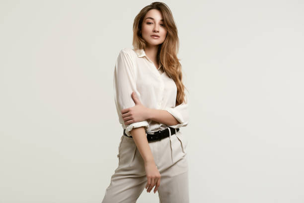 istock Gorgeous female brunette model in white clothes 1148523275