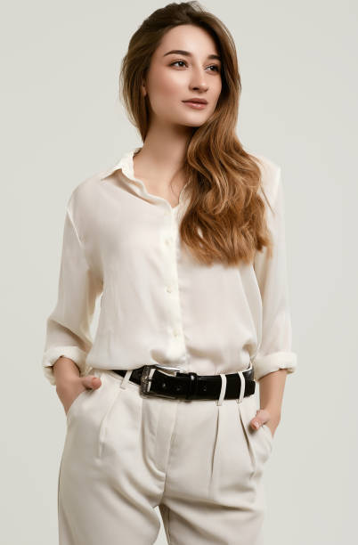 istock Gorgeous female brunette model in white clothes 1148523293