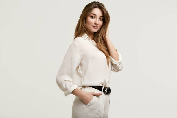 istock Gorgeous female brunette model in white clothes 1148523305
