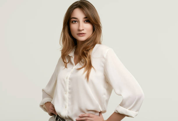 istock Gorgeous female brunette model in white clothes 1148523308