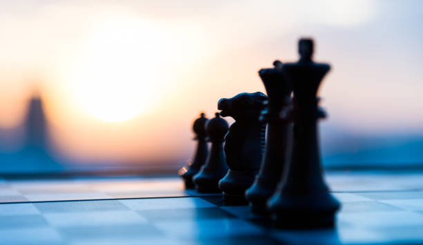 istock Chess board and pieces in a chess game 1148526037