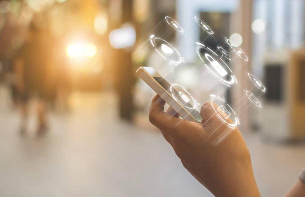 istock Hand using smartphone with icon graphic cyber security network of connected devices and personal data information 1148526086