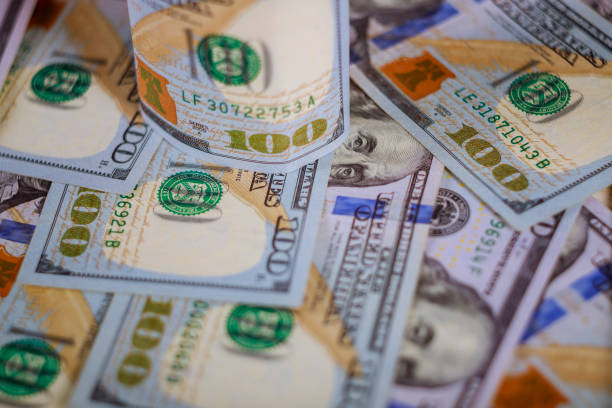 istock Background of US hundred dollar banknotes 1148527094