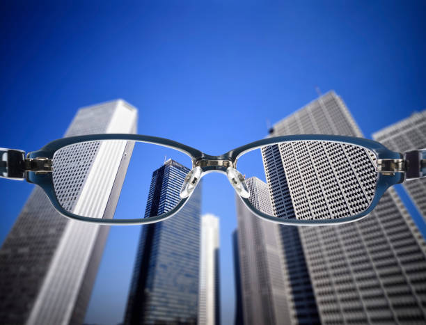 istock Dark blue glasses with skyscrapers 1148535785