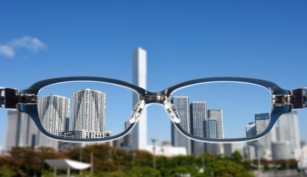 istock Dark blue glasses with skyscrapers 1148535787