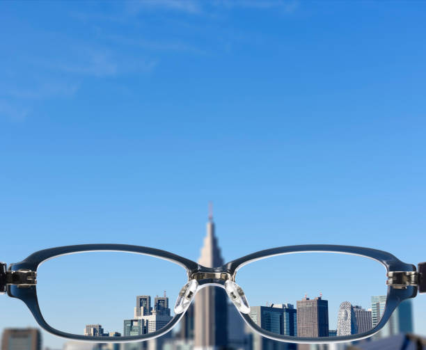 istock Dark blue glasses with skyscrapers 1148535789