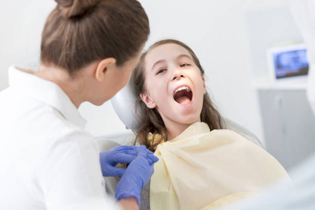 istock Medical personel (doctors, nurses and dentists) during different procedures with patients. 1148535804
