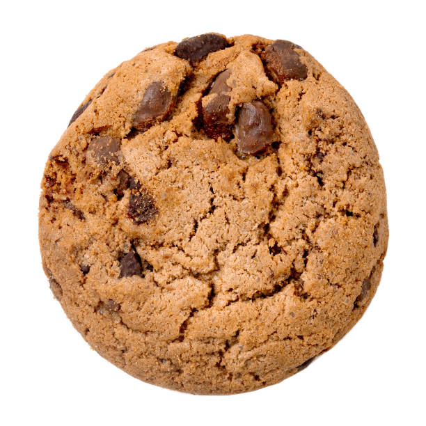 istock Chocolate chip cookie with chocolate pieces  isolated on white background. Macro 1148535878