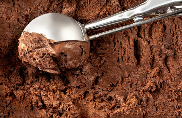 istock Chocolate  ice cream scoop.  Dark cocoa Ice-cream Background or Texture. Top view