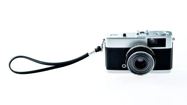 Photo of Vintage camera on white background