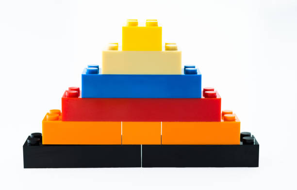 istock Pyramid of plastic blocks on white background 1148539029