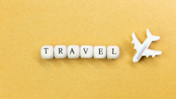 istock travel  wood cube close up image  for travel content. 1148539988