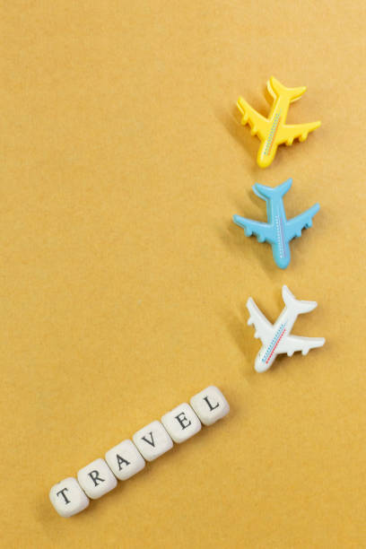 istock travel  wood cube close up image  for travel content. 1148540069