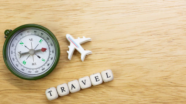 istock travel  wood cube close up image  for travel content. 1148540638