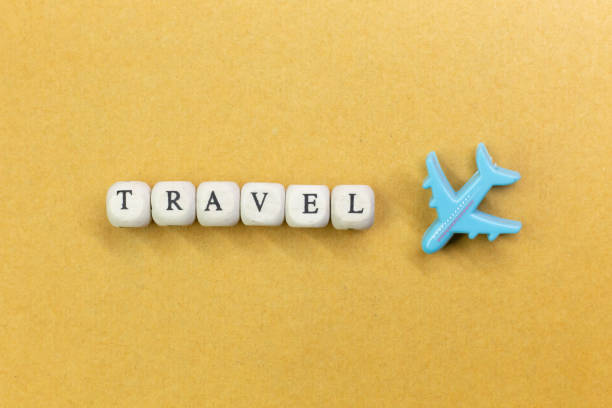 istock travel  wood cube close up image  for travel content. 1148540689