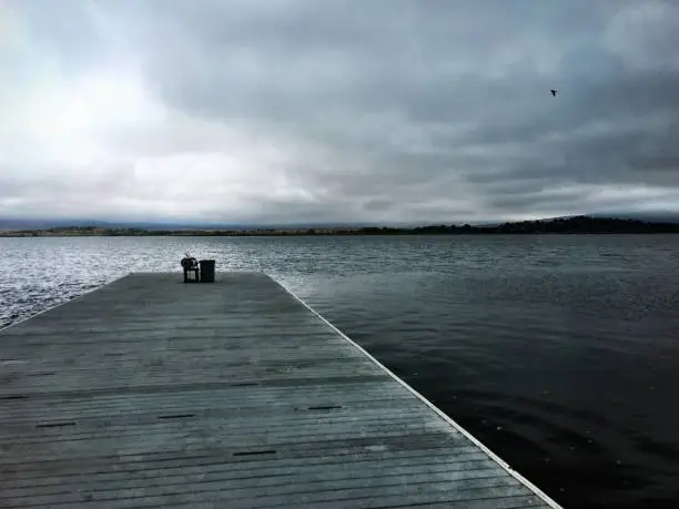 A boat dock on Lake Henshaw with rain on its way