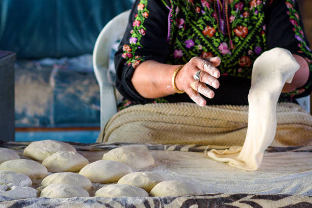 istock Muslim woman making food. 1148543111