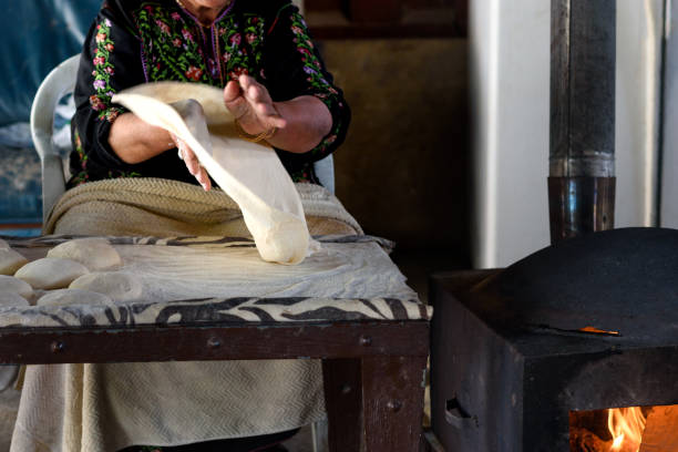 istock Muslim woman making food. 1148543113