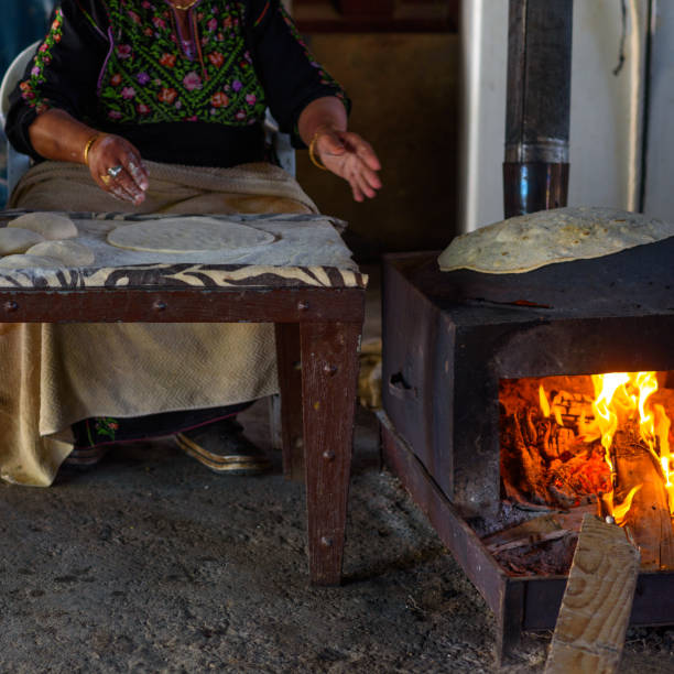 istock Muslim woman making food. 1148543115