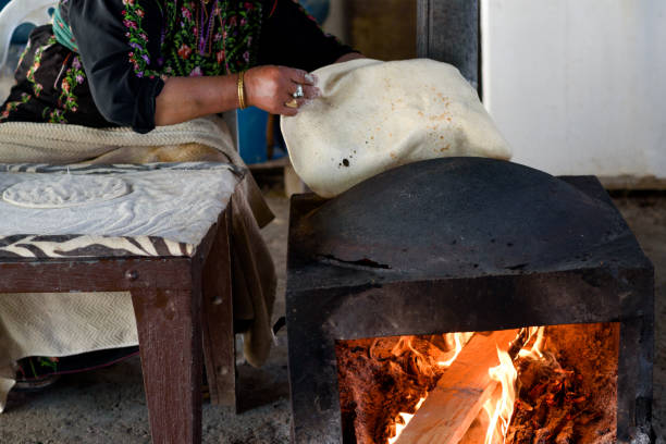 istock Muslim woman making food. 1148543119