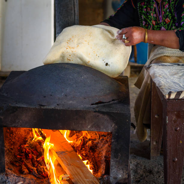 istock Muslim woman making food. 1148543121