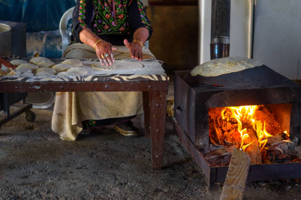istock Muslim woman making food. 1148543122