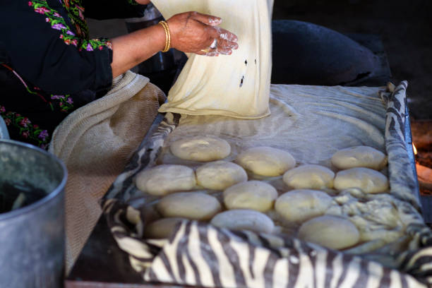 istock Muslim woman making food. 1148543126
