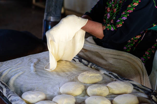 istock Muslim woman making food. 1148543129