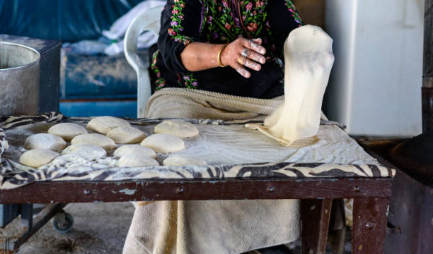 istock Muslim woman making food. 1148543132