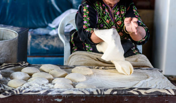 istock Muslim woman making food. 1148543134