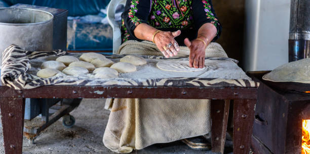 Muslim woman making food.
