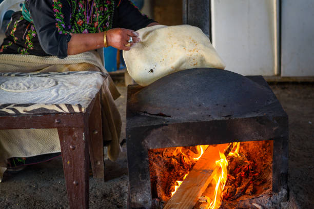 istock Muslim woman making food. 1148543140