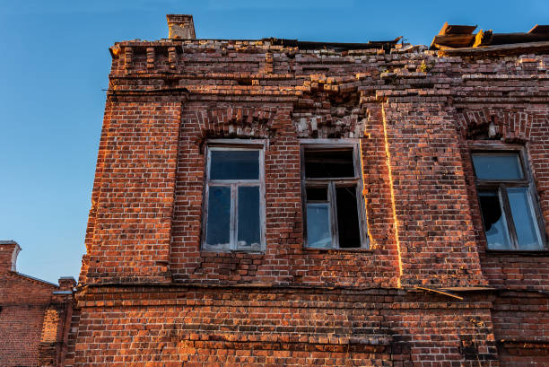 istock The facade of an ancient brick abandoned building 1148545140