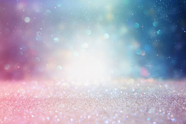 istock abstract glitter silver, purple, blue and gold lights background. de-focused 1148546134