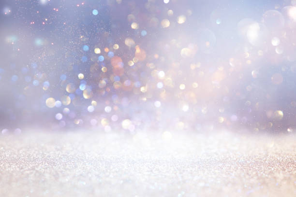 istock abstract glitter silver and gold lights background. de-focused 1148546284