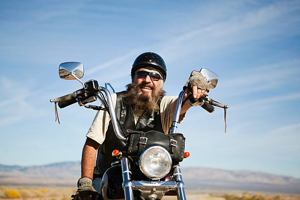 portrait of senior motorcyclist - motor vehicle road trip western usa southern california 뉴스 사진 이미지