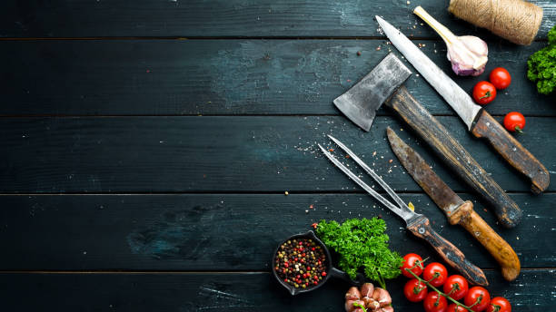 istock BBQ banner. Cutlery barbecue. Top view. Free space for your text. Rustic style. 1148550393