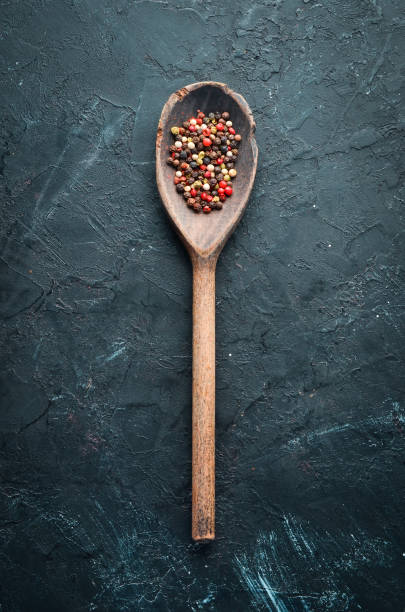istock Pepper peas Spices on a black background. Top view. free space for your text. 1148551493
