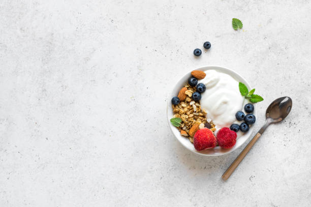 istock Breakfast bowl with granola and yogurt 1148553673