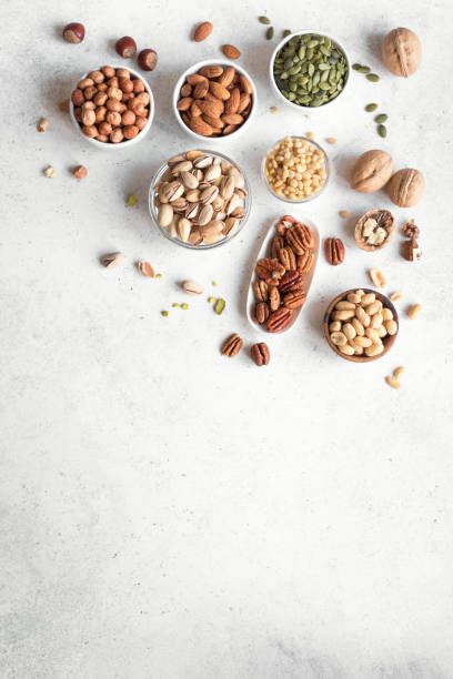 nuts sortiment - pine nut nut seed vegan food stock-fotos und bilder