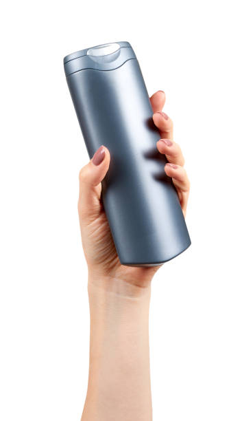 istock Hand with plastic cosmetic bottle, shampoo and soap gel. 1148557977