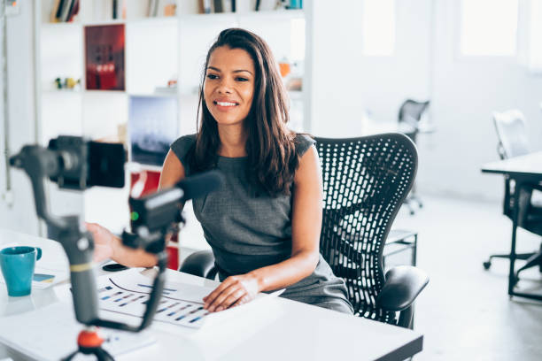 istock Businesswoman vlogging at the office 1148560052