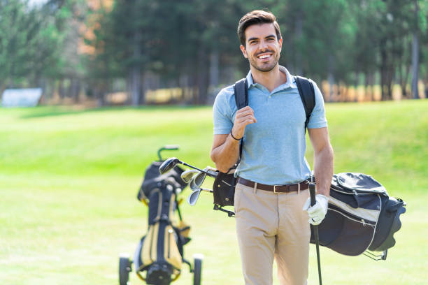 istock Male golfer standing on golf course 1148561369