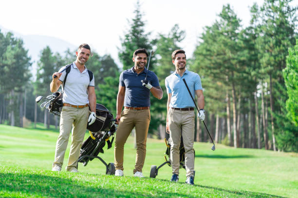 istock Friends Playing Golf on a Beautiful Sunny Day 1148561372