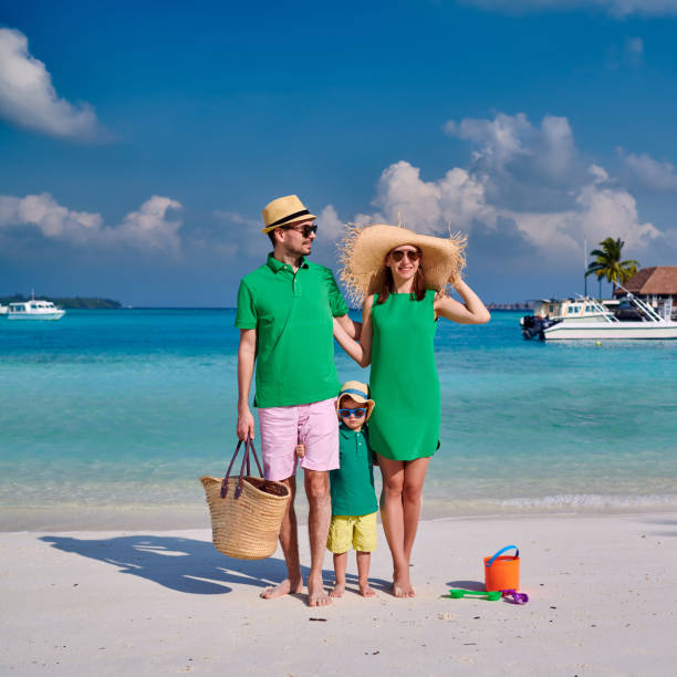 istock Family with three year old boy on beach 1148561428