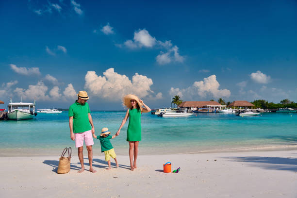 istock Family with three year old boy on beach 1148561745