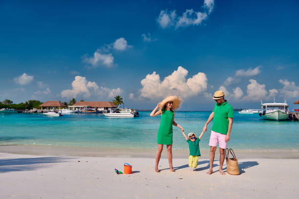 istock Family with three year old boy on beach 1148561778